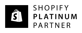 Shopify Platinum Partner logo with a black square and white text: Total Commerce