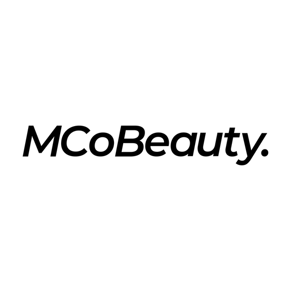 Black 'MCoBeauty' logo on a white background